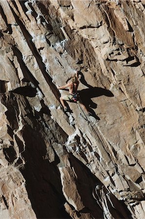 simsearch:400-04949609,k - Climber Scaling a Rock Face Stock Photo - Rights-Managed, Code: 858-03047522