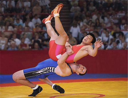 Wrestler Throwing Opponent Stock Photo - Rights-Managed, Code: 858-03047620