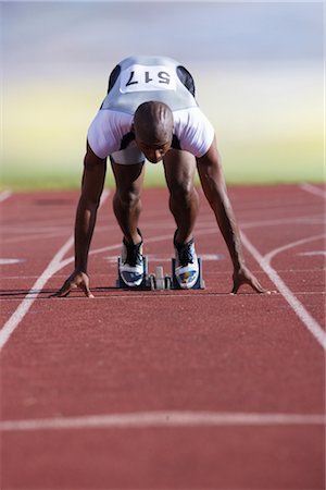 Sprinter On His Blocks Stock Photo - Rights-Managed, Code: 858-03048198