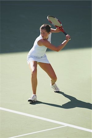 Tennis Player Hitting Ball Stock Photo - Rights-Managed, Code: 858-03048765