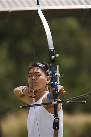 Archer Aiming Stock Photo - Rights-Managed, Code: 858-03048978