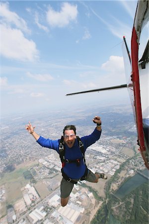 paragliding extreme sport - Man jumping from plane Stock Photo - Rights-Managed, Code: 858-03049389