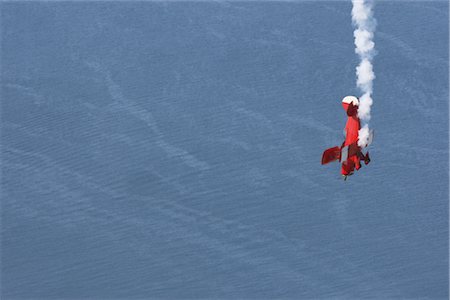 show aircraft - Aerobatics show over beach leaving smoke trail Stock Photo - Rights-Managed, Code: 858-03049424