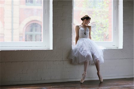 Ballet dancer looking outside of the window Stock Photo - Rights-Managed, Code: 858-03049489