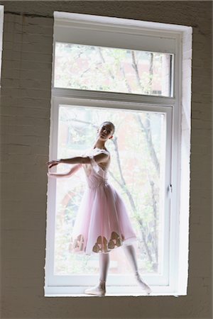 Ballet dancer dancing in window Stock Photo - Rights-Managed, Code: 858-03049491
