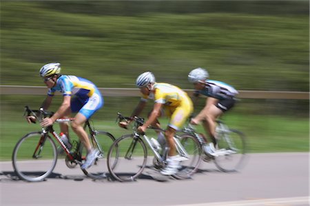 simsearch:400-04280818,k - Bicyclists racing on road Stock Photo - Rights-Managed, Code: 858-03049505