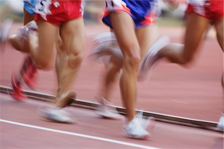 simsearch:622-01956194,k - Blurred image of runners on track Foto de stock - Con derechos protegidos, Código: 858-03049595