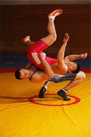 Wrestler Throwing Opponent Stock Photo - Rights-Managed, Code: 858-03049630