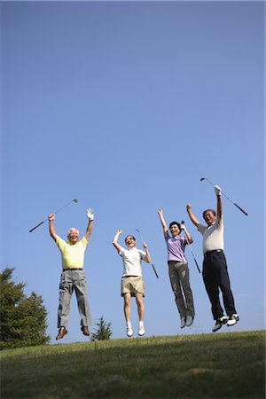 senior japanese golfer - Victorious golfers jumping with raised arms Stock Photo - Rights-Managed, Code: 858-03049921