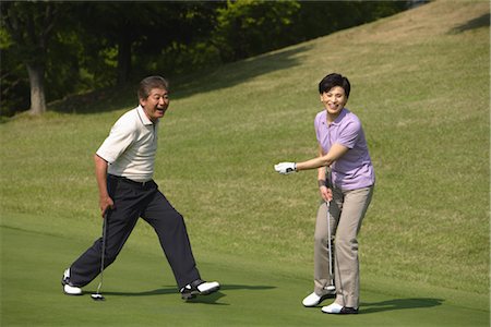 freizeitsport - Paar mit Spaß am Golfplatz Stockbilder - Lizenzpflichtiges, Bildnummer: 858-03049949