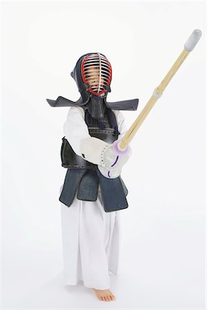 Kendo fencer looking at camera Stock Photo - Rights-Managed, Code: 858-03050009