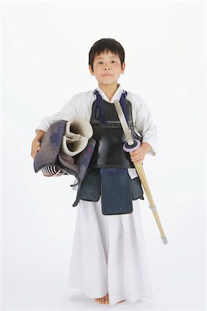 Kendo fencer looking at camera Stock Photo - Rights-Managed, Code: 858-03050003