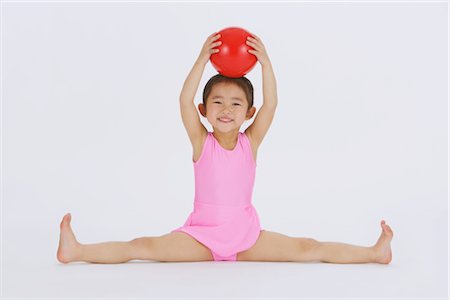 Girl performing rhythmic gymnastic Stock Photo - Rights-Managed, Code: 858-03050019