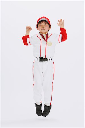 Smiling Japanese boy with medal Stock Photo - Rights-Managed, Code: 858-03050035