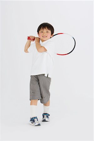 simsearch:858-03050017,k - Child posing with badminton racket Fotografie stock - Rights-Managed, Codice: 858-03050039