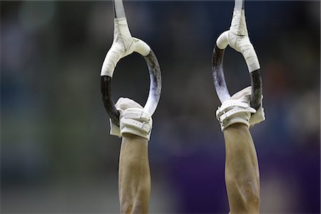 Gymnast holding onto rings Stock Photo - Rights-Managed, Code: 858-03050057