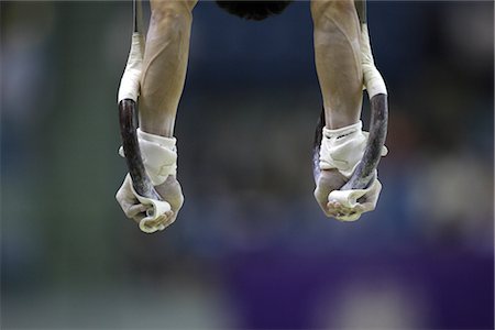 Gymnast holding onto rings Stock Photo - Rights-Managed, Code: 858-03050058