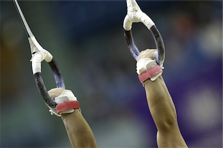 Gymnast holding onto rings Stock Photo - Rights-Managed, Code: 858-03050059