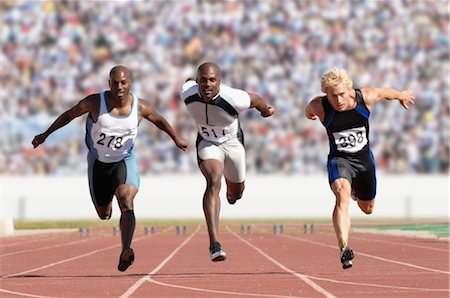 explosive runner - Three Sprinters Crossing the Finish Line Stock Photo - Rights-Managed, Code: 858-03050066