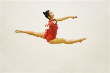 Jeune femme assure de gymnastique rythmique Photographie de stock - Rights-Managed, Code: 858-03050201