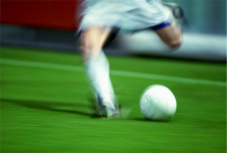 soccer goalkeeper backside - Kicking the Soccer Ball Stock Photo - Rights-Managed, Code: 858-03051035