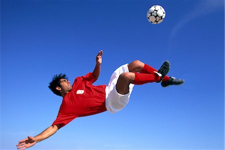 simsearch:858-03051086,k - Bicycle Kick Fotografie stock - Rights-Managed, Codice: 858-03051078