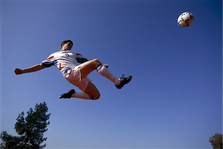 simsearch:858-03052307,k - Bicycle Kick Fotografie stock - Rights-Managed, Codice: 858-03051084