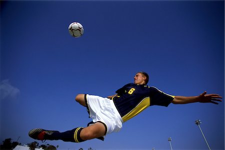 simsearch:858-03051086,k - Bicycle Kick Fotografie stock - Rights-Managed, Codice: 858-03051089