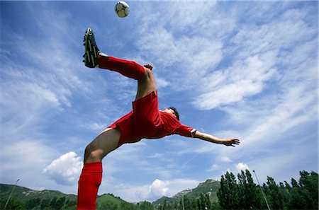 simsearch:858-03051086,k - Bicycle Kick Fotografie stock - Rights-Managed, Codice: 858-03051112