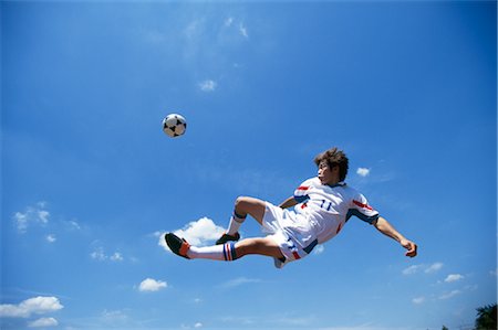 simsearch:858-03051086,k - Bicycle Kick Fotografie stock - Rights-Managed, Codice: 858-03051175