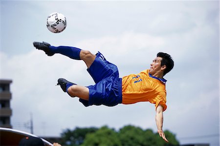 simsearch:858-03051086,k - Bicycle Kick Fotografie stock - Rights-Managed, Codice: 858-03051186