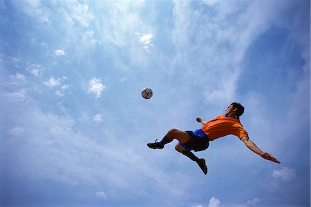 simsearch:858-03051086,k - Bicycle Kick Fotografie stock - Rights-Managed, Codice: 858-03051204