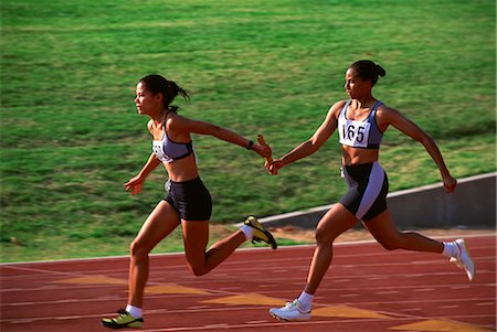 relay race baton exchange - Relay Race Stock Photo - Rights-Managed, Code: 858-03051493