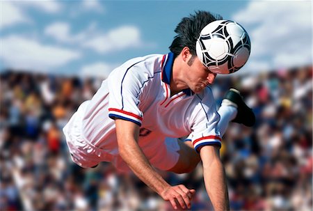 simsearch:858-03052307,k - Soccer (Heading The Ball) Fotografie stock - Rights-Managed, Codice: 858-03051523