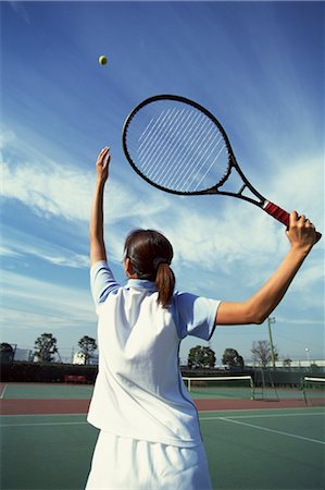 Tennis (Mid-air Serve) Stock Photo - Rights-Managed, Code: 858-03052320