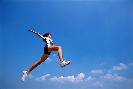 salto em distância - Long Jumper Foto de stock - Direito Controlado, Número: 858-03053009