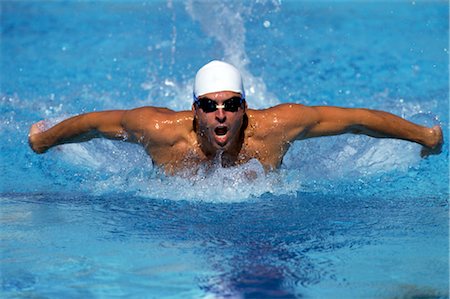 Swimming (Butterfly Stroke) Fotografie stock - Rights-Managed, Codice: 858-03053144