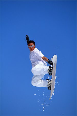 simsearch:858-03045479,k - Snowboard (Luft) Stockbilder - Lizenzpflichtiges, Bildnummer: 858-03053632