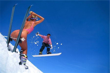 pictures of people in snow in bathing suit - Snowboarding (Mid-Air) Stock Photo - Rights-Managed, Code: 858-03053661