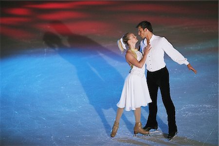 Figure Skaters Performing in Rink Stock Photo - Rights-Managed, Code: 858-03448626