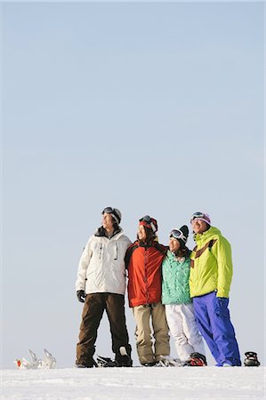 simsearch:858-03448671,k - Couples Standing on Snowfield Stock Photo - Rights-Managed, Code: 858-03448729