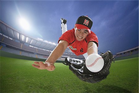 playing a baseball game - Baseball Player Catching Ball Stock Photo - Rights-Managed, Code: 858-03448737