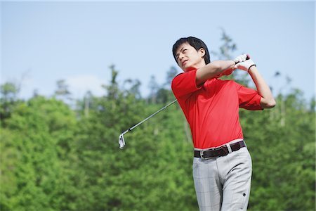 Man Playing Golf On Golf Course Stock Photo - Rights-Managed, Code: 858-03694341