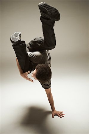 Hip Hop Dancer Performing in Studio Stock Photo - Rights-Managed, Code: 858-03694413