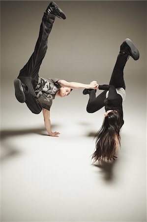 dance studio break dancers - Hip Hop Dancer Performing in Studio Stock Photo - Rights-Managed, Code: 858-03694425