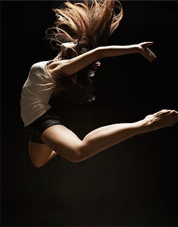 strong female acrobats - Hip Hop Dancer dans Studio Photographie de stock - Rights-Managed, Code: 858-03694441