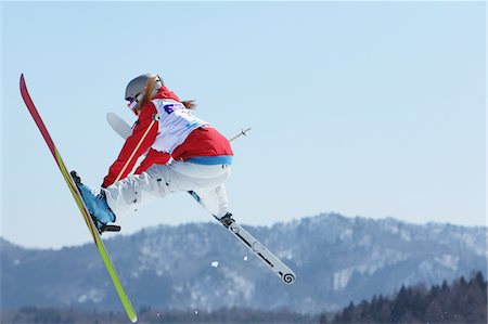Female Freestyle Skier Getting Some Air Stock Photo - Rights-Managed, Code: 858-03694520
