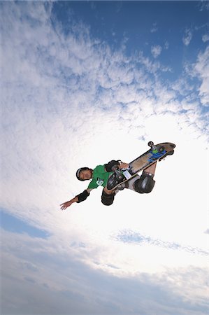 Skateboarder getting some air Stock Photo - Rights-Managed, Code: 858-03799622