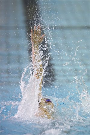 simsearch:622-02621605,k - Man swimming backstroke in pool Stock Photo - Rights-Managed, Code: 858-03799659