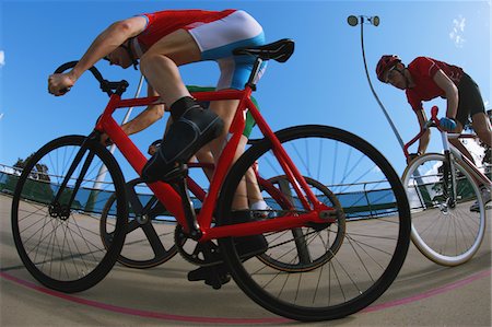 Cyclists racing on velodrome Foto de stock - Con derechos protegidos, Código: 858-03799745